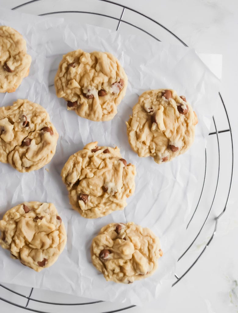 easy delicious and chewy chocolate chip cookie recipe with a glass of milk