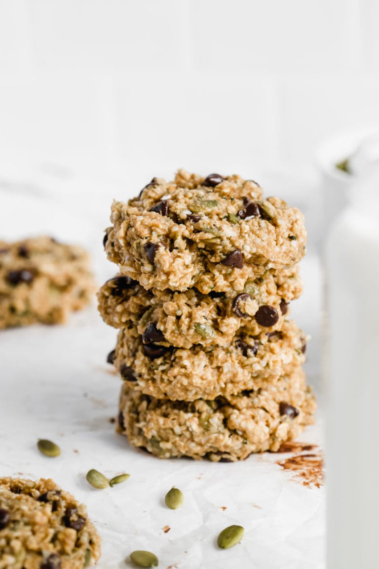 Side view of superfood gluten free protein cookies stacked on top of one another.