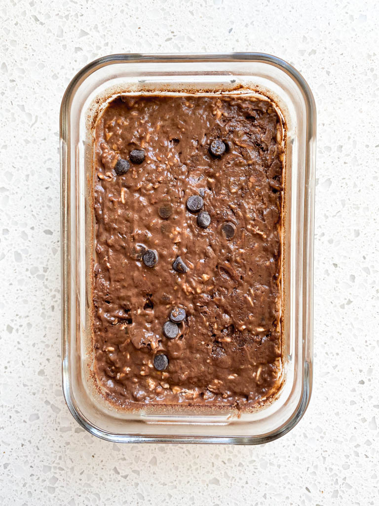 chocolate peanut butter overnight oats in a glass casserole 