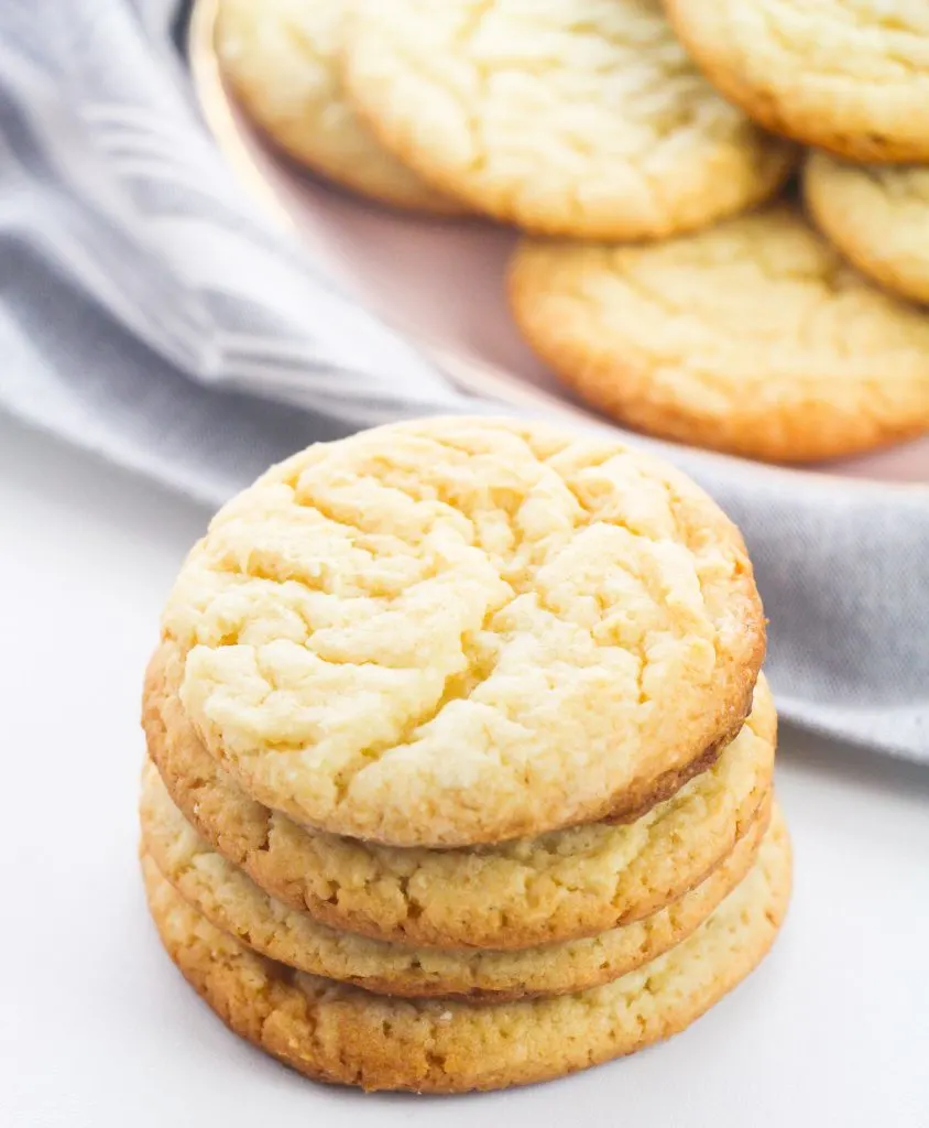 easy cake mix sugar cookies stacked on top of one another