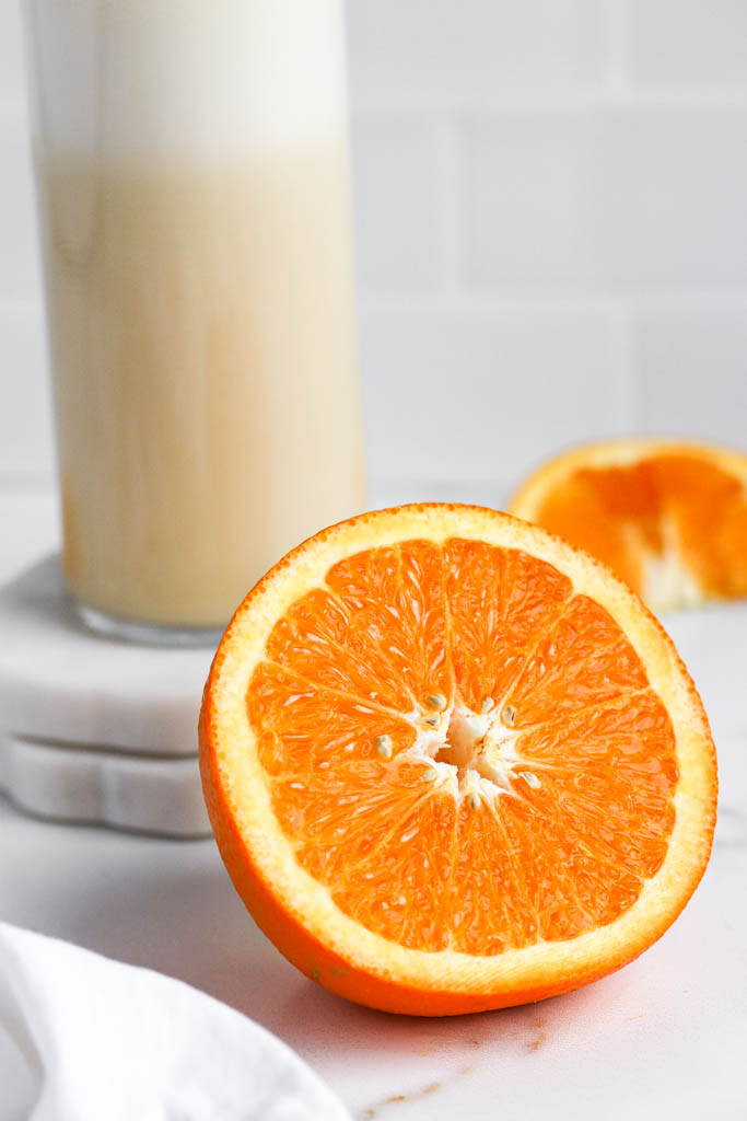 healthy ingredients in an orange smoothie