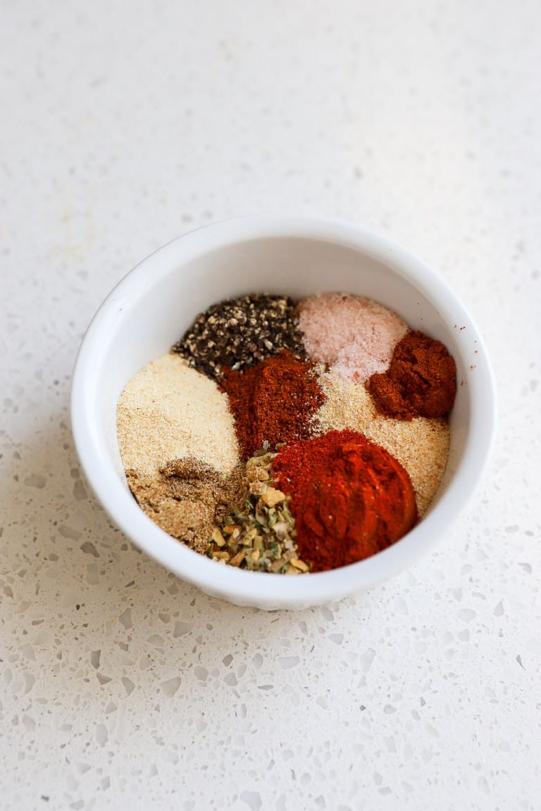 top down view of a mix of seasonings in small white ramekin