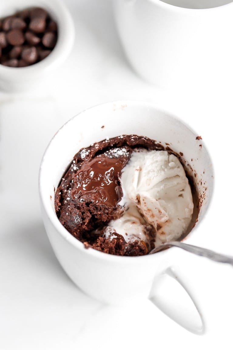 top down view of a chocolate mug cake recipe in a coffee mug