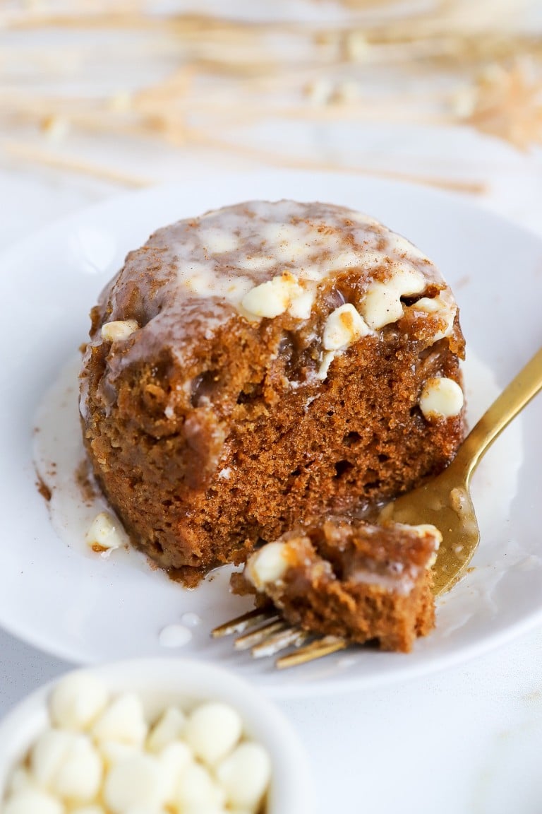 side angle of pumpkin spice mug cake with white chocolate chips