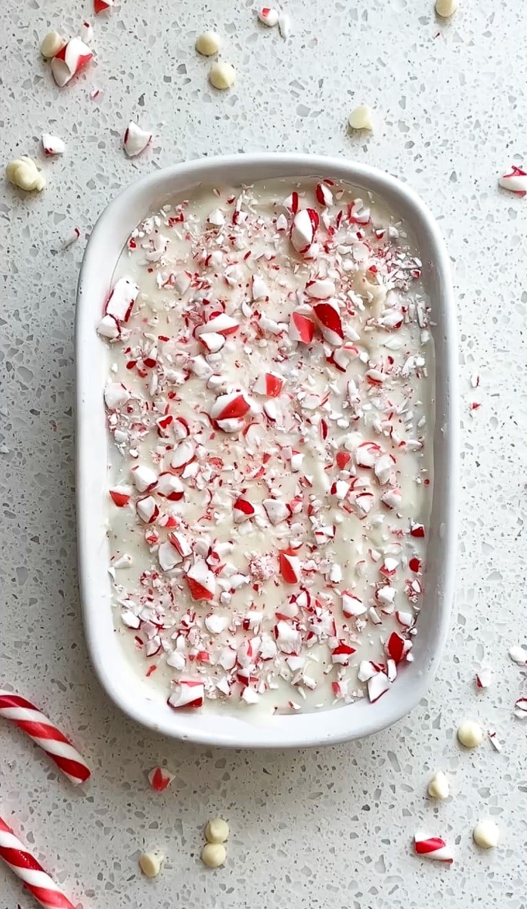 top down view of peppermint white chocolate overnight oats in white ramekin