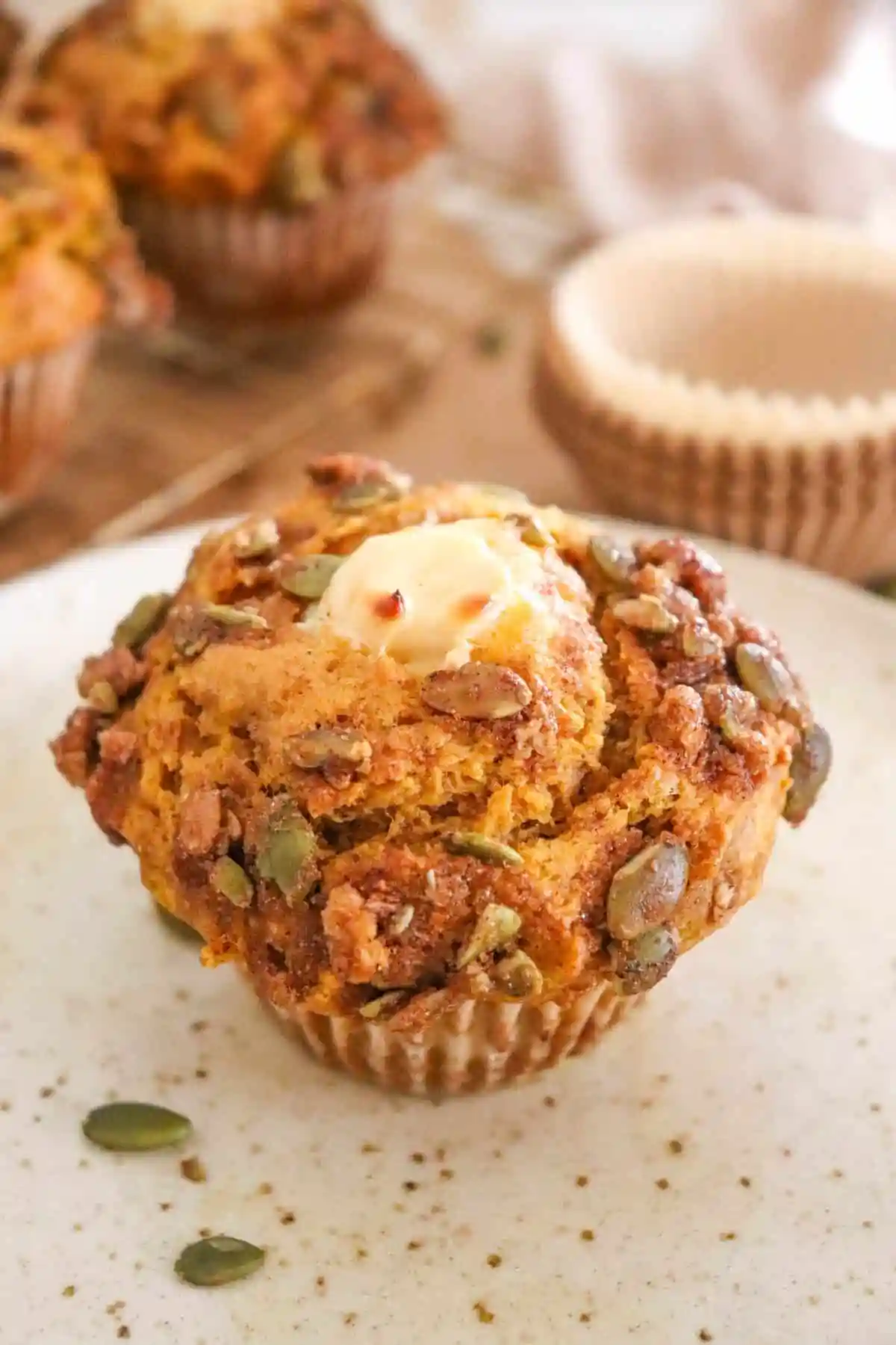 side angle of Starbucks pumpkin muffin recipe with cream cheese in the middle