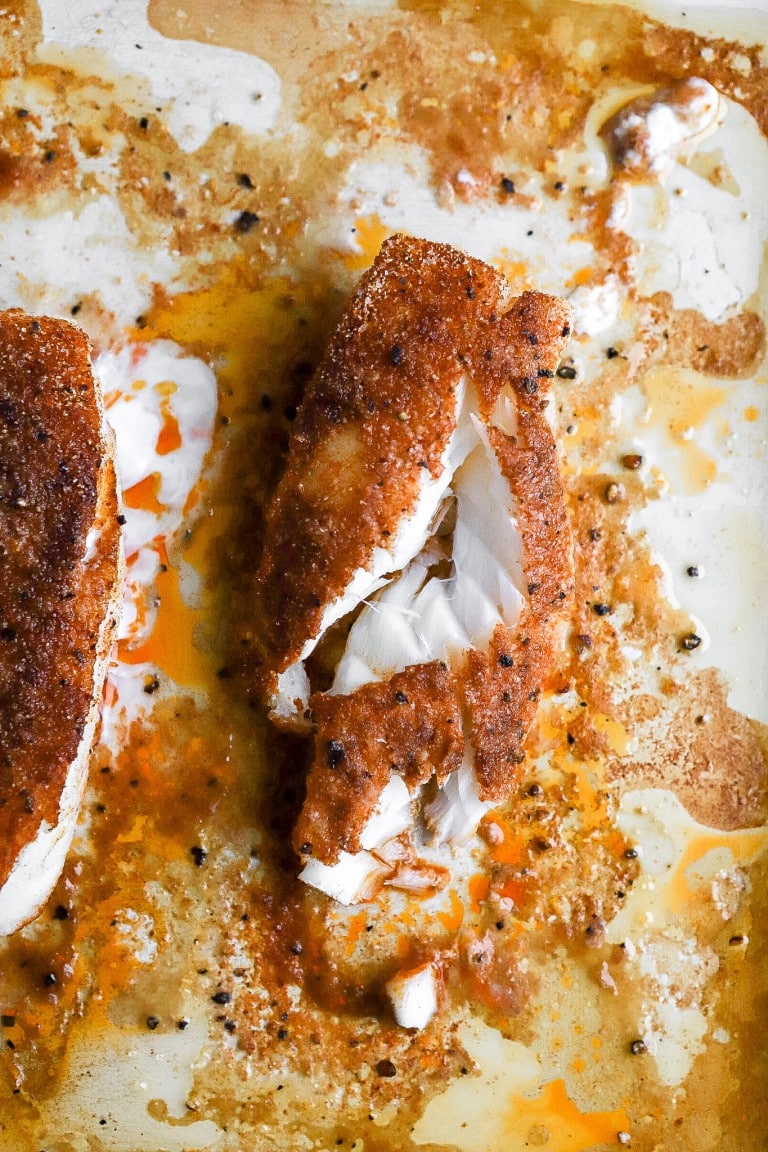 top down view of air fryer fish recipe with paprika