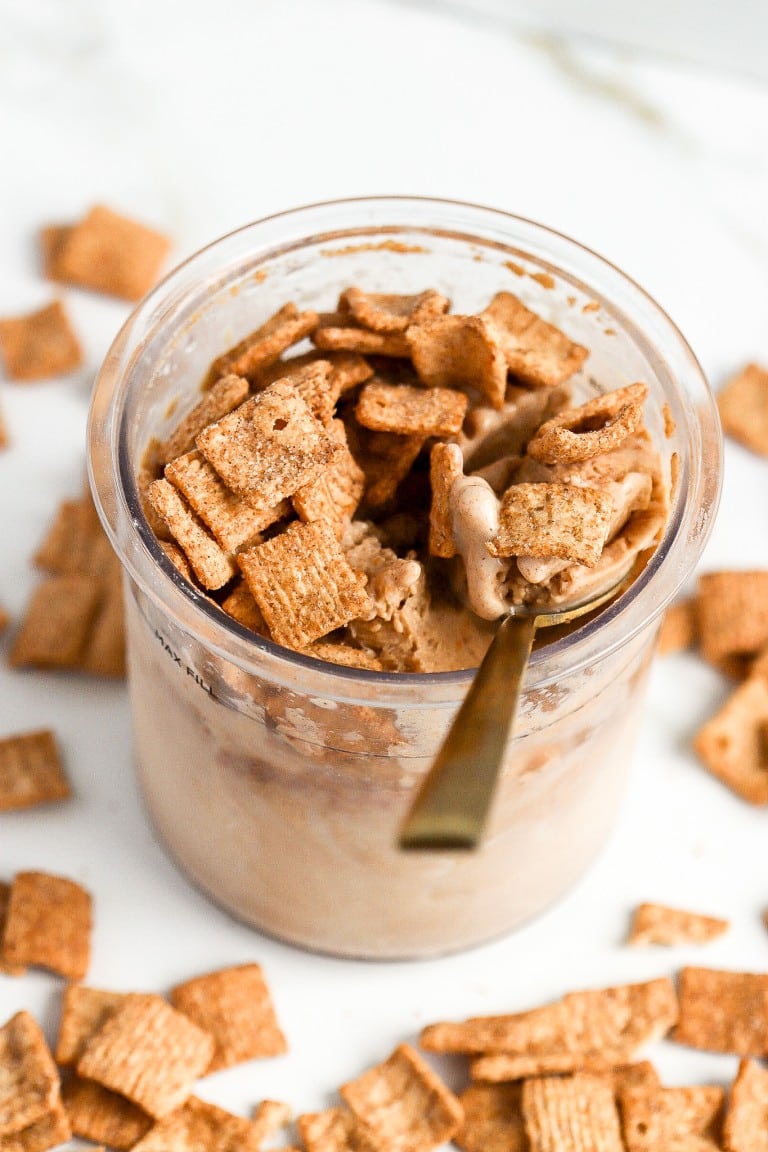 cinnamon toast crunch ice cream in a jar with a spoon on top