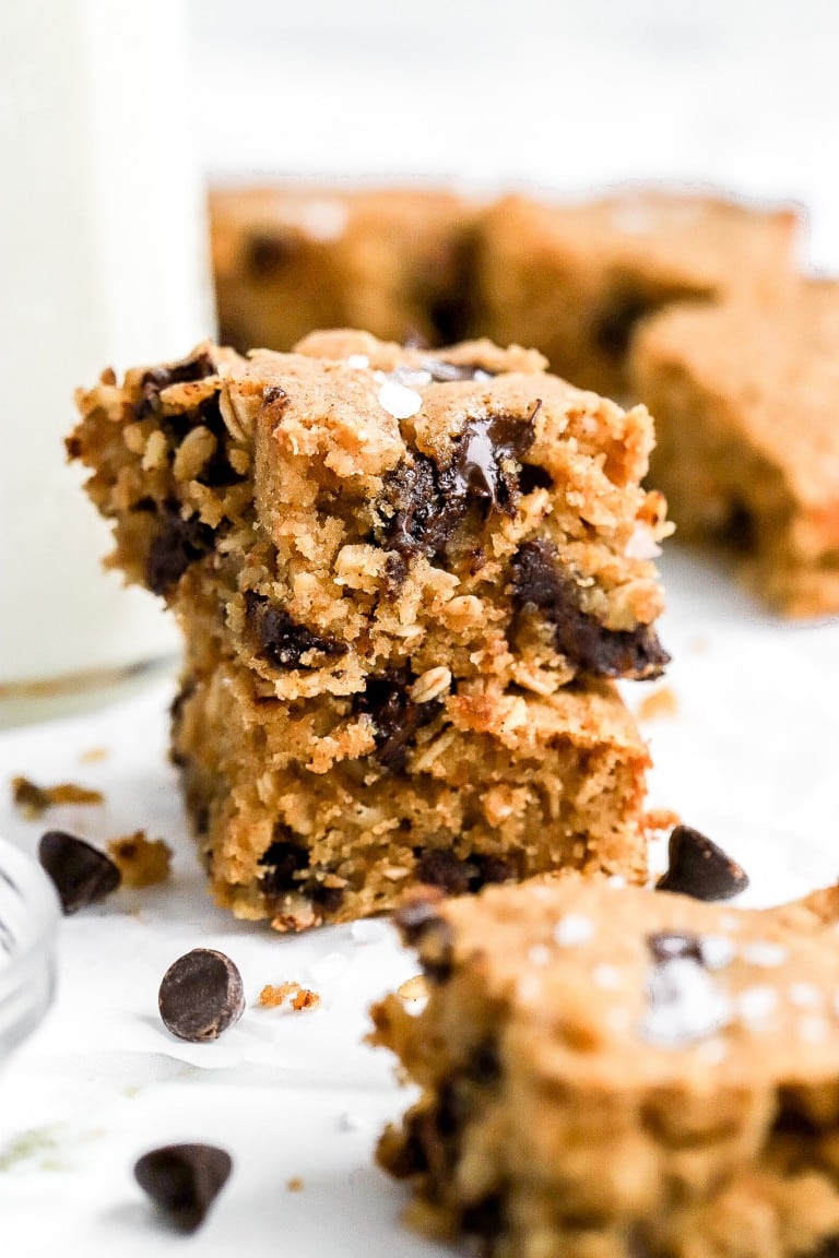 close up shot of 2 oatmeal bars stacked on one another with chocolate chips inside