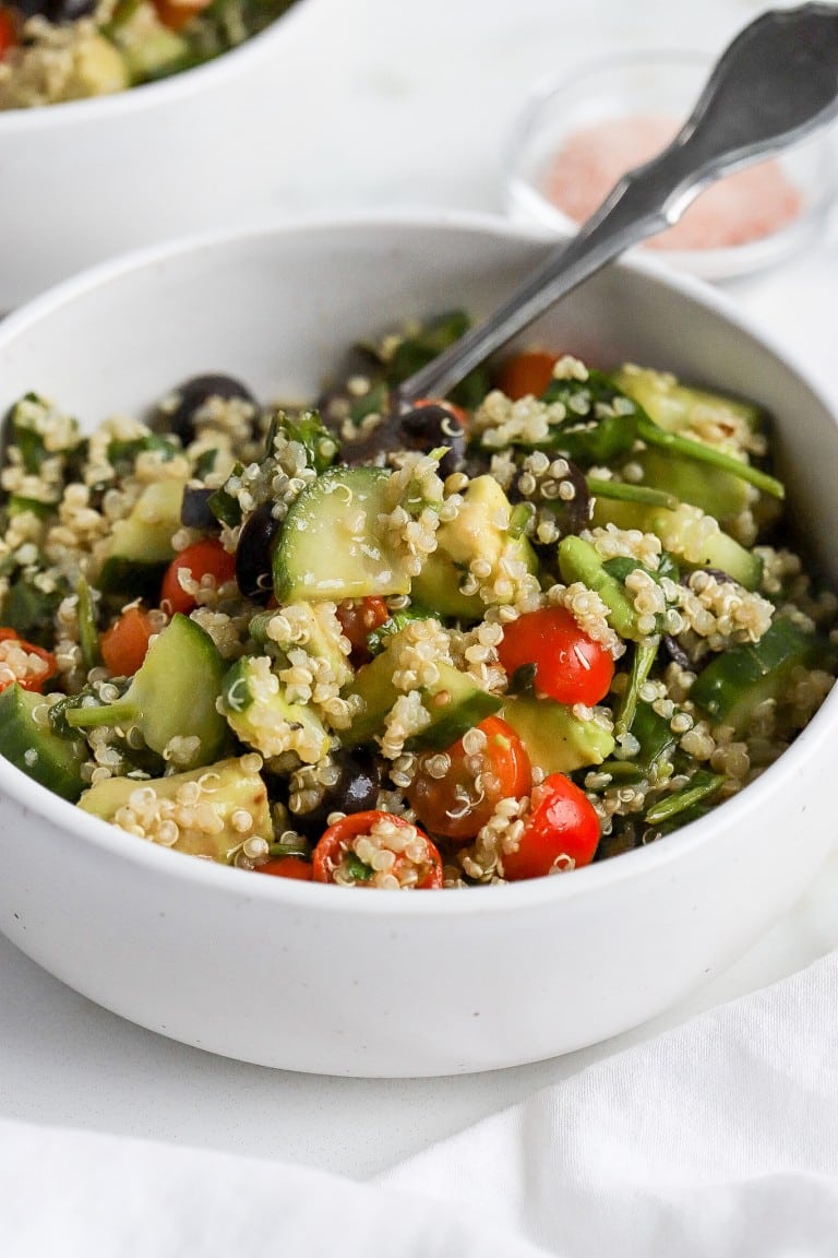 side angle of superfood salad recipe with fresh avocado