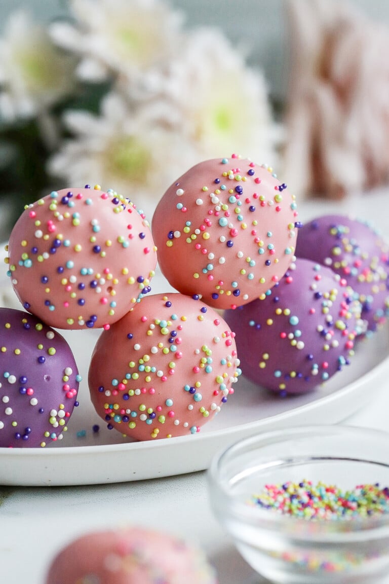 side view of easy easter cake pops with flowers in background