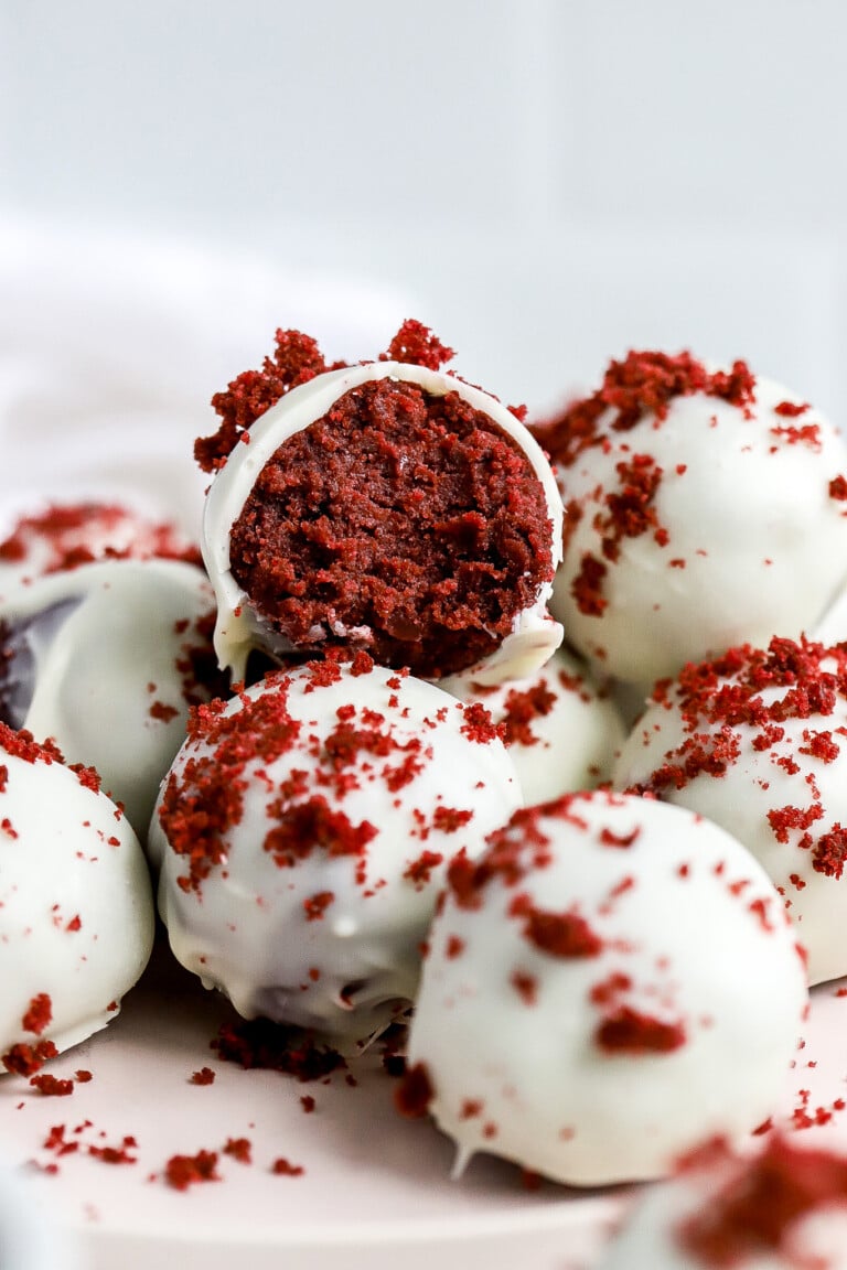 close up shot of red velvet cake balls with crumb topping