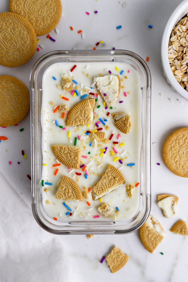 Top down view of easy protein sugar cookie overnight oats in a glass container.