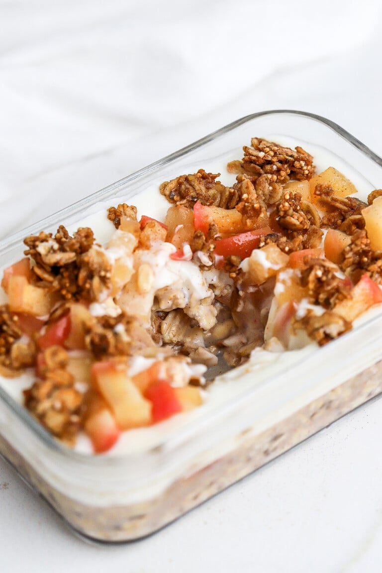 Close up view of protein apple pie overnight oats in glass jar.