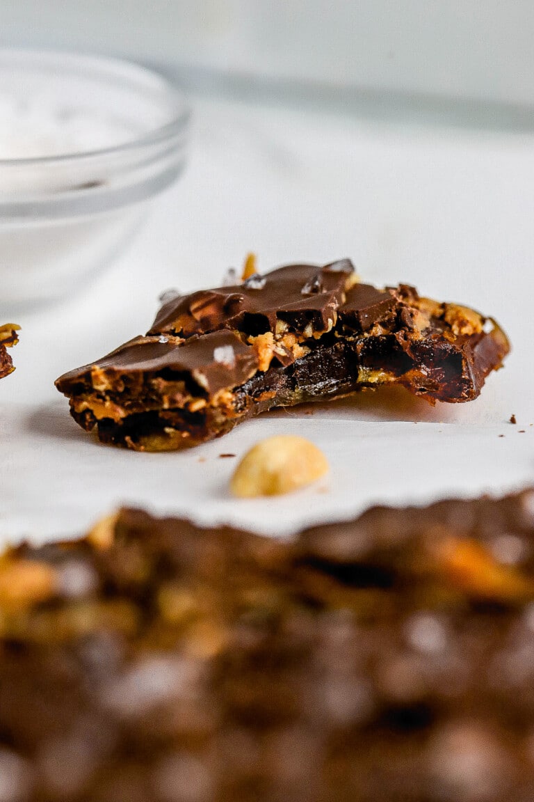 Close up shot of chewy date bark with peanut butter and chocolate.