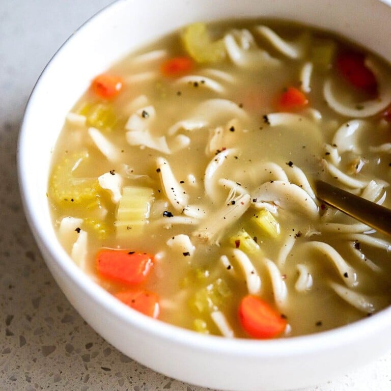 chicken carcass soup with noodles side view